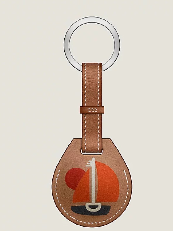 Apple AirTag Hermès key ring in Gold Swift calfskin, “Picto Echappee” print